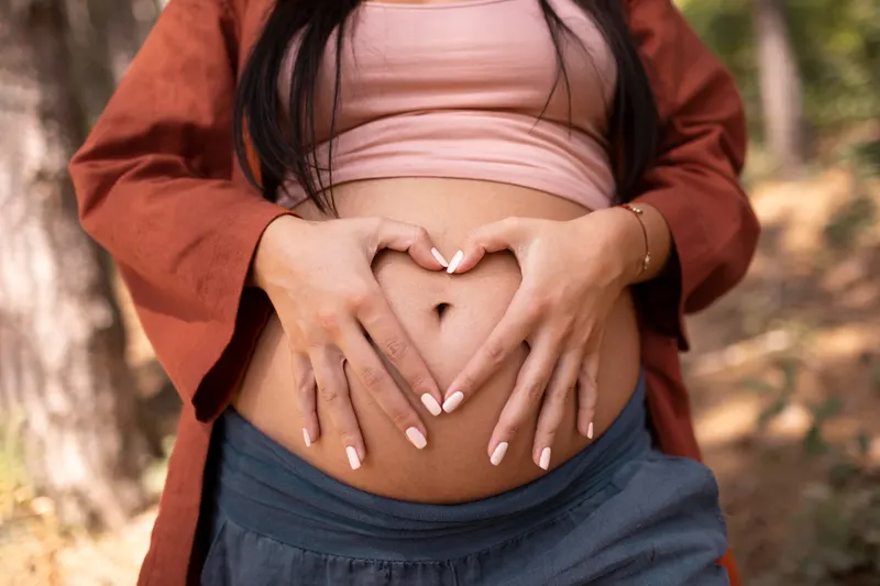 A pregnant woman outdoors